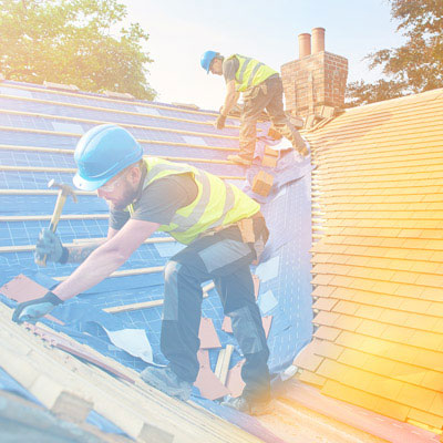 Gower Homes builders working on roof in Wrexham